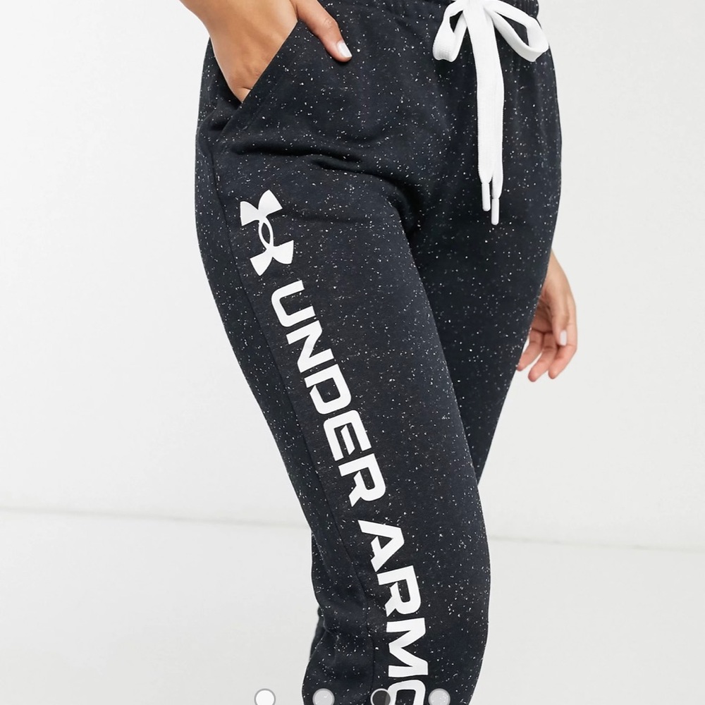 Black and white speckled under Armour sweatpants.